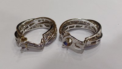 Lot 2255 - A Pair of Diamond Trinity Hoop Earrings, by...