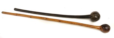 Lot 334 - A 19th Century Zulu Knobkerrie, of rich dark...