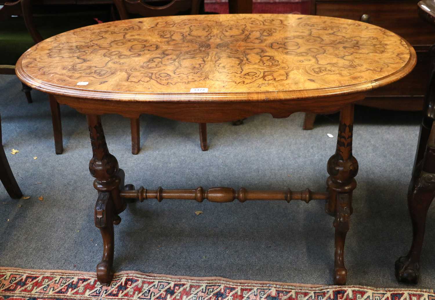1474 Table Lot 1474 - A Victorian Walnut Centre Table, with oval