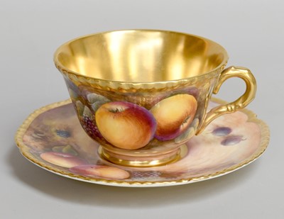 Lot 180 - A Royal Worcester Porcelain Tea Cup and Saucer,...