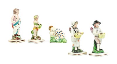 Lot 38 - A Pair of Pearlware "Cupid Disguised" Figures,...