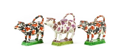 Lot 45 - A Pair of Staffordshire Pottery Cow Creamers,...