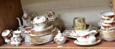 Lot 337 - Royal Albert 'Old Country Roses' dinner and tea service and a Crown Devon musical jug