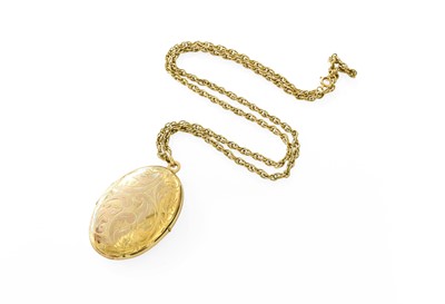 Lot 384 - A 9 Carat Gold Locket on Chain, the oval...