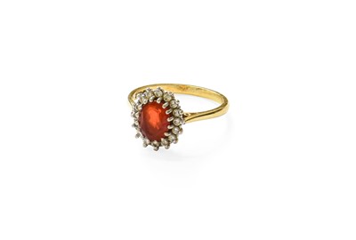 Lot 385 - An 18 Carat Gold Fire Opal and Diamond Cluster...