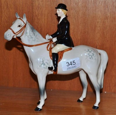 Lot 345 - A Beswick huntsman on grey horse