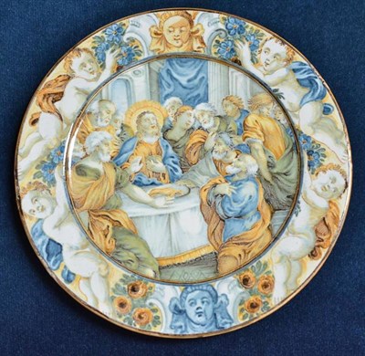 Lot 351 - An 18th century maiolica dish painted with the last supper, 17cm diameter