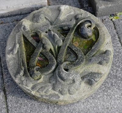 Lot 1271A - A Weathered Stone Roundel, carved with the...