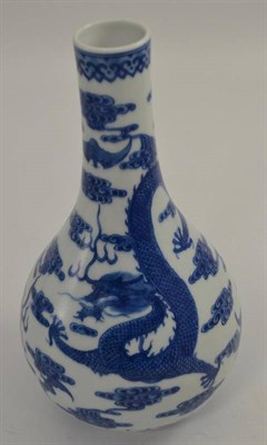 Lot 357 - A Chinese porcelain vase of recent date, blue and white, painted with a dragon amongst clouds...