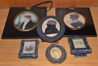 Lot 360 - A 19th century oval portrait miniature of a gentleman, an oval silhouette portrait of a lady, a...