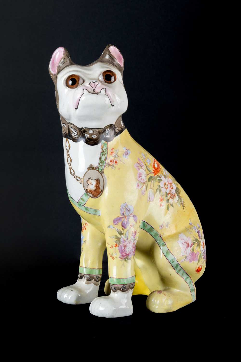 Lot 316 - A Continental Pottery Model of a Seated Dog in...