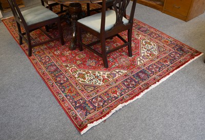 Lot 1077 - Tabriz Carpet, the blood red field of angular...