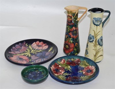 Lot 378 - Three pieces of Moorcroft Anemone pattern; plate (second), 26cm wide, plate (plate hanger fixed...