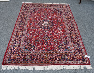 Lot 1076 - Kashan Rug, the raspberry field of scrolling...