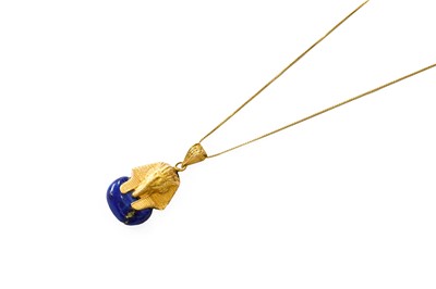 Lot 433 - A Lapis Lazuli Tutankhamun Pendant on Chain,...