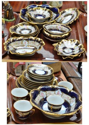 Lot 385 - A Royal Austrian porcelain twenty nine piece gros bleu and gilt tea and dessert service (on two...