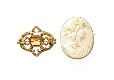 Lot 449 - A Cameo Brooch, carved to depict a classical...