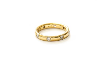 Lot 484 - An 18 Carat Gold Diamond Eternity Ring, eight...