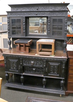 Lot 1496 - A Carved Oak Mirror Back Sideboard, in...