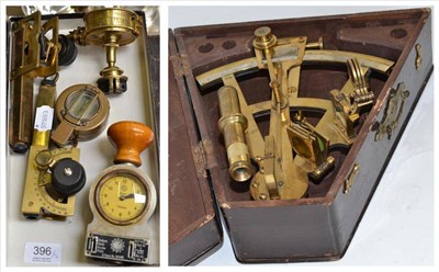 Lot 396 - A 1942 pocket compass, two inclinometers 1941 and 1985, a brass sextant - cased, an Erfu time stamp