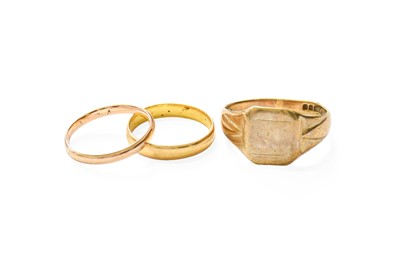 Lot 426 - A 22 Carat Gold Band Ring, finger size J1/2; A...