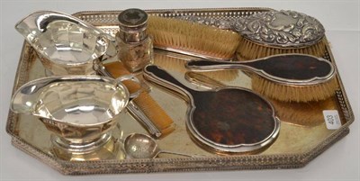 Lot 403 - A pair of silver sauce boats, a silver backed hair brush, four silver and tortoiseshell...