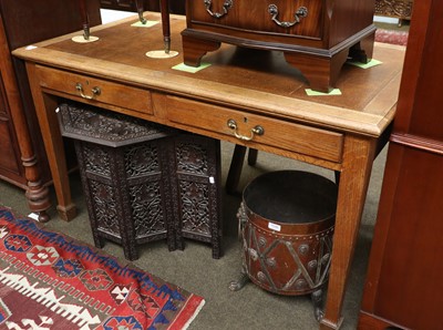 Lot 1545 - An Early 20th Century Oak Writing Table, with...