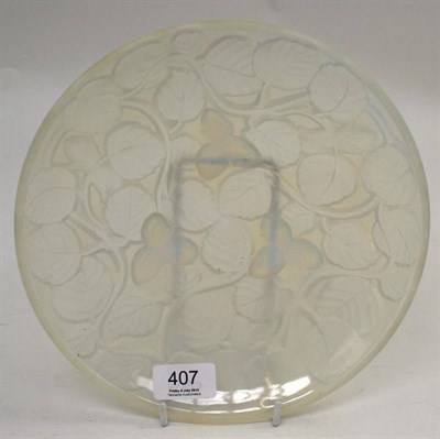 Lot 407 - A French opalescent plate stamped Arrers, 24cm wide