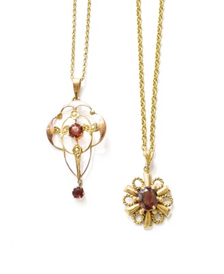 Lot 514 - A 9 Carat Gold Garnet Pendant on Chain,...