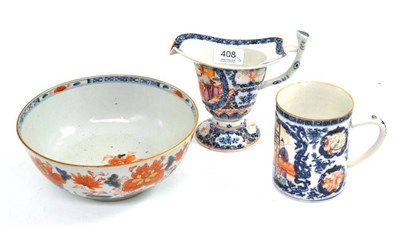 Lot 408 - A 19th century Chinese famille rose decorated jug, a similar mug and an Imari bowl (3)