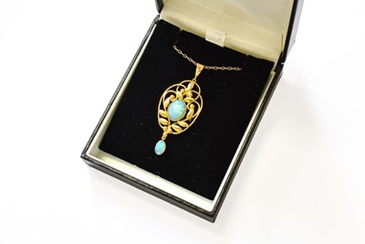 Lot 476 - An Opal Pendant on a Chain, an oval cabochon...