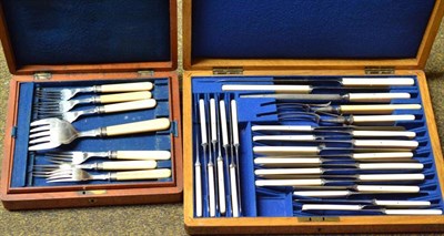 Lot 413 - A brass bound oak canteen of steel bladed and ivory handled knives and a mahogany cased set of fish