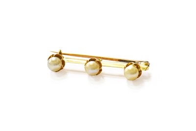 Lot 479 - A Cultured Pearl Brooch, three cultured pearls...