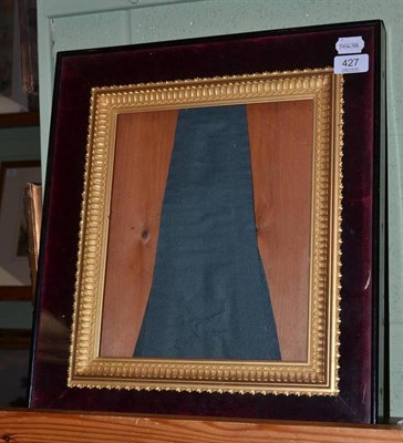 Lot 427 - A 19th century gilt gesso frame in a velvet lined presentation case