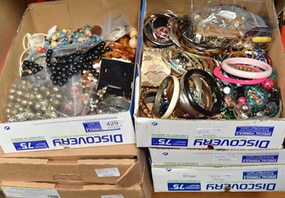 Lot 429 - A large quantity of costume jewellery in six boxes, including brooches, necklaces, earrings,...