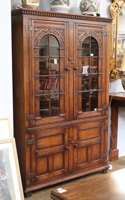 Lot 1312 - A Titchmarsh & Goodwin Carved Oak Bookcase,...