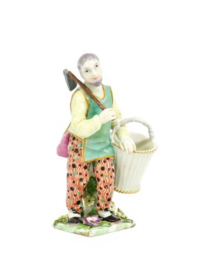 Lot 27 - A Chelsea Porcelain Figure of a Gardener,...