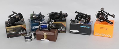 Lot 114 - An Assortment Of Various Spinning And Multiplier Reels