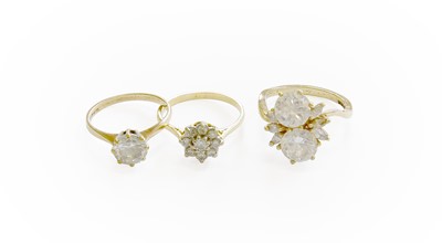 Lot 63 - A Diamond Cluster Ring, the central round...