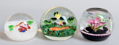 Lot 193 - Three Glass Paperweights, including: William...