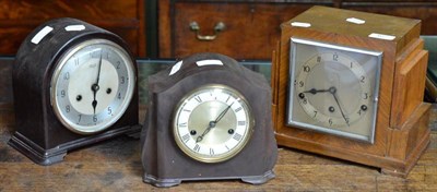 Lot 467 - Three Art Deco mantel clocks including two Bakelite examples by Smiths