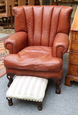 Lot 1410 - A Reproduction Studded Brown Leather Armchair,...