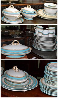 Lot 471 - A late 19th century Royal Worcester part dinner service, painted turquoise and highlighted in gilt