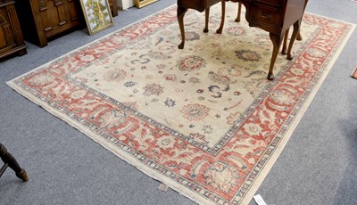 Lot 1153 - Afghan Carpet, the ivory field with large...