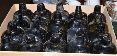 Lot 472 - A collection of approximately sixty green glass gin bottles by V.Hoytema and Co and others