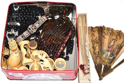 Lot 495 - A Georgian fan (a.f.), an ivory brisee fan, three tortoiseshell combs, Bakelite tiara, ivory...