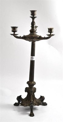 Lot 504 - A 19th century silver plated three branch candelabra with paw feet and column stem (two nozzles...