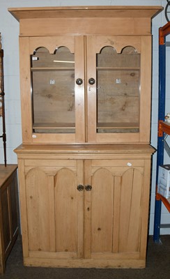 Lot 1571 - A Victorian Pine Bookcase, with arch top doors...