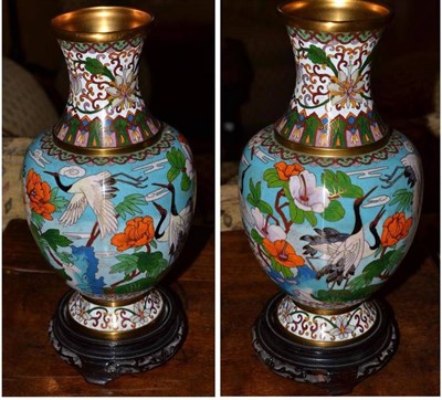 Lot 512 - A pair of cloisonne vases on stands, 26cm high