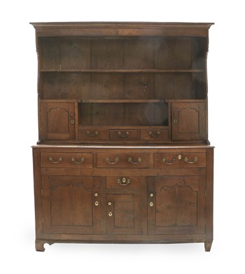 Lot 309 - A George III Oak Enclosed Dresser and Rack,...